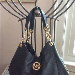 Michael Kors Hobo Leather  Handbag with gold chain accents - Slightly Used
